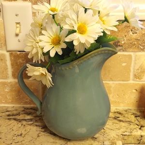 Pitcher with flowers